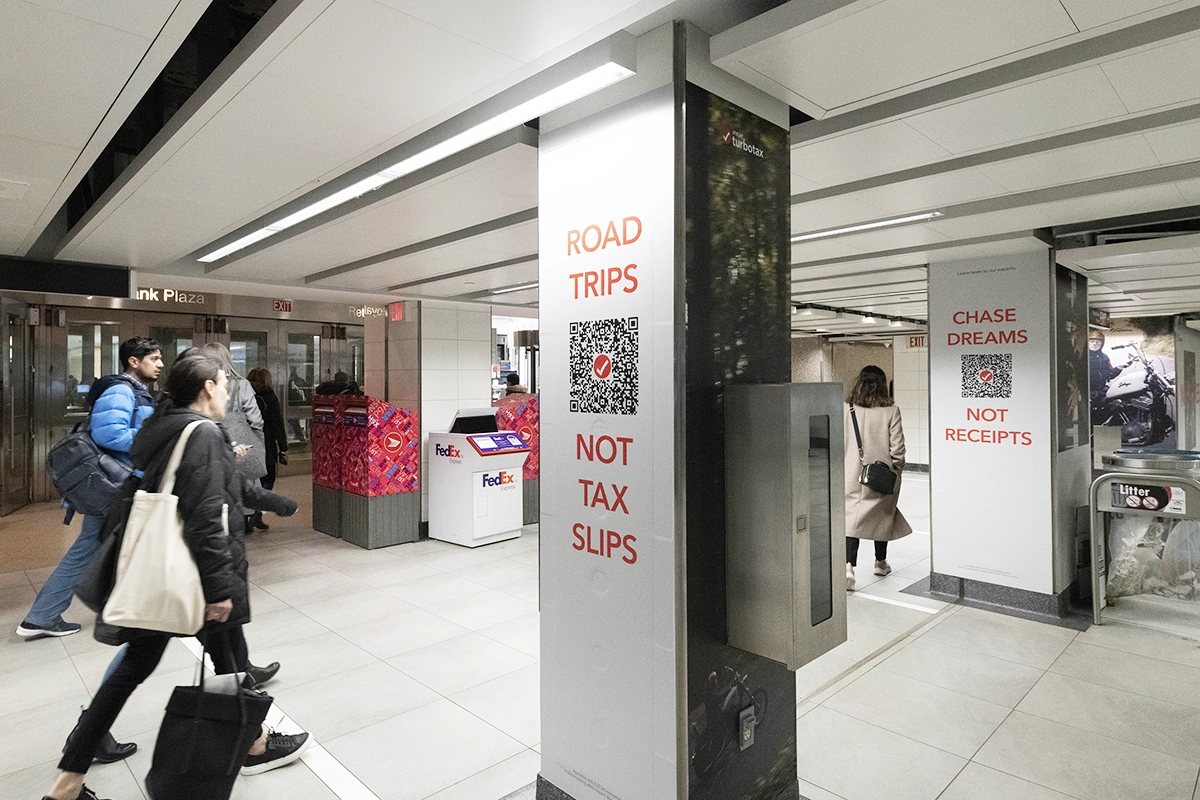 Scanning QR code in an OOH advertising campaign TURBOTAX